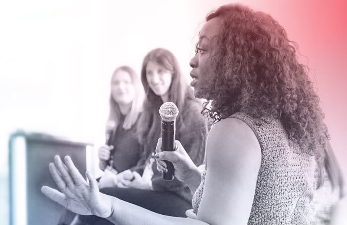 woman talking with other women