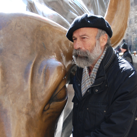 Arturo Di Modica (the one in the beret)