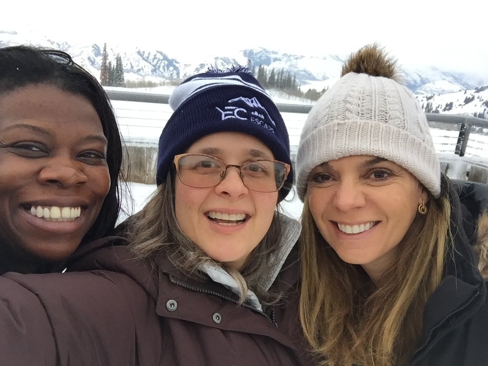 Laura Mignott, Elisa Miller-Out and Melinda Nicci grab a selfie on the ski slopes.